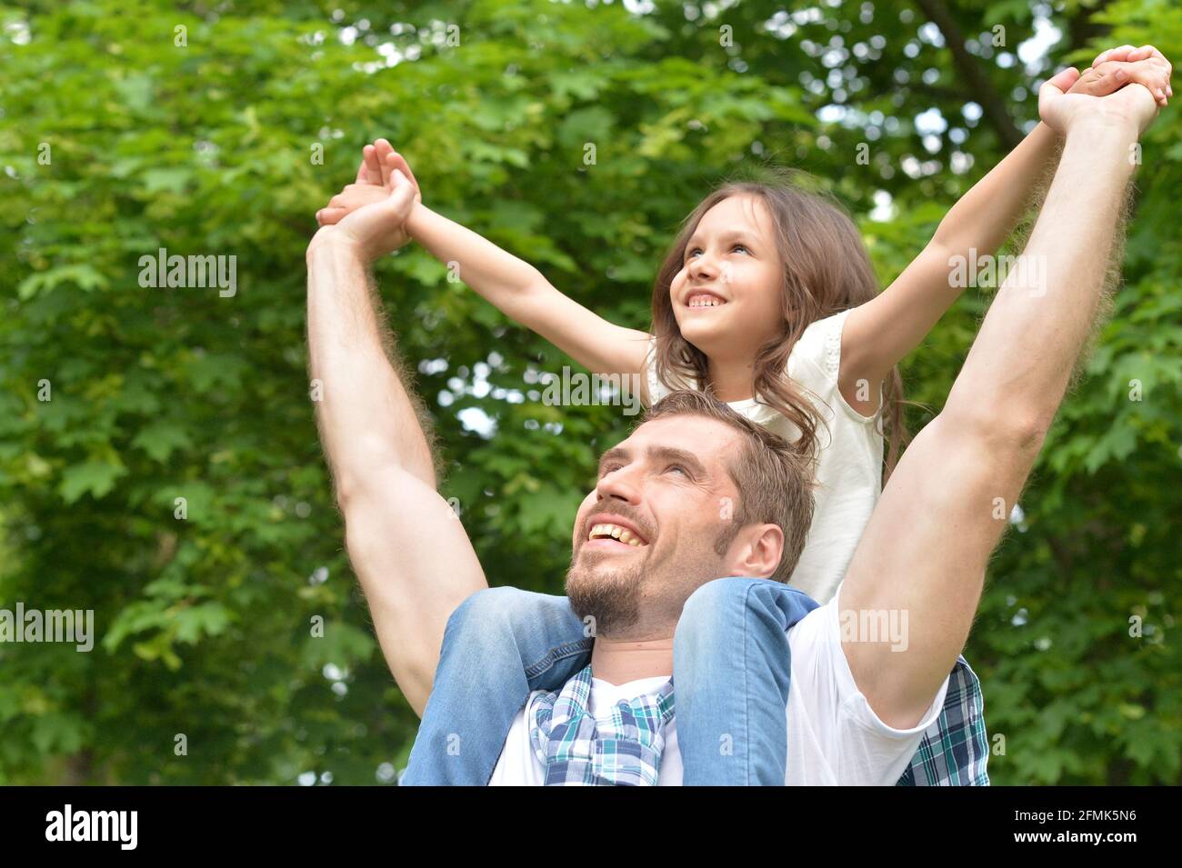 Portrait of father and daughter having fun outdoors Stock Photo
