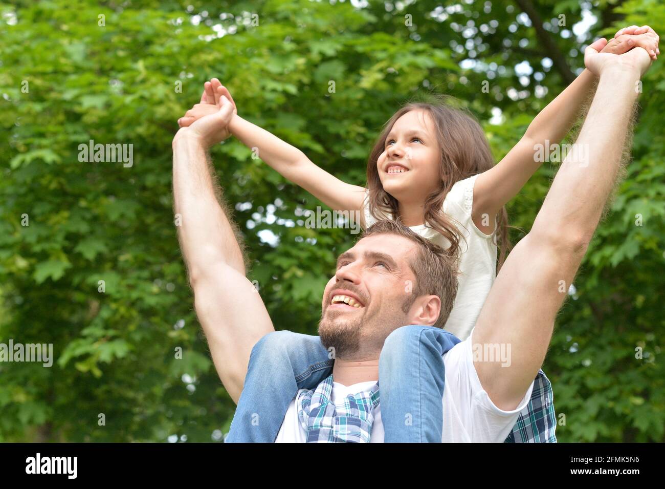 Portrait of father and daughter having fun outdoors Stock Photo - Alamy