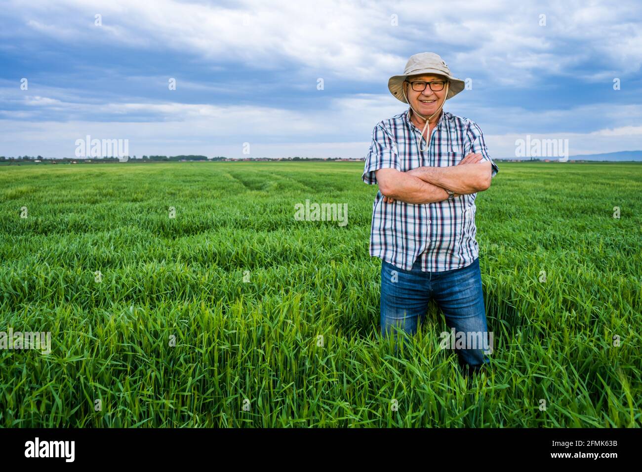 Farmer in barley field hi-res stock photography and images - Alamy