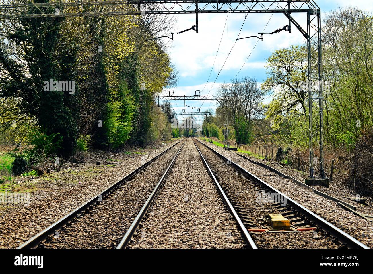 Straight stretch of a railway line Stock Photo