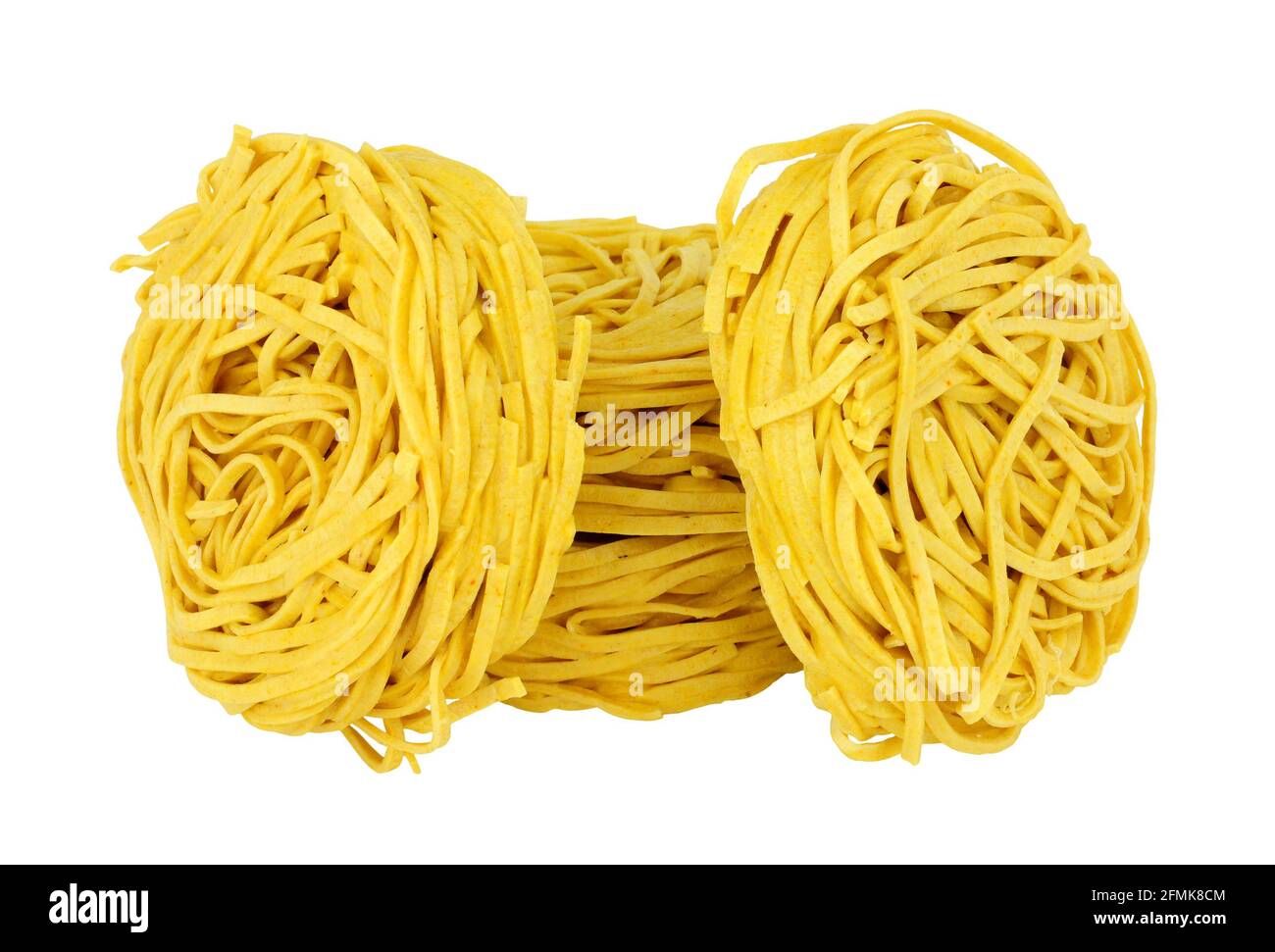 Chinese dried medium egg noodle nests isolated on a white background Stock Photo Alamy