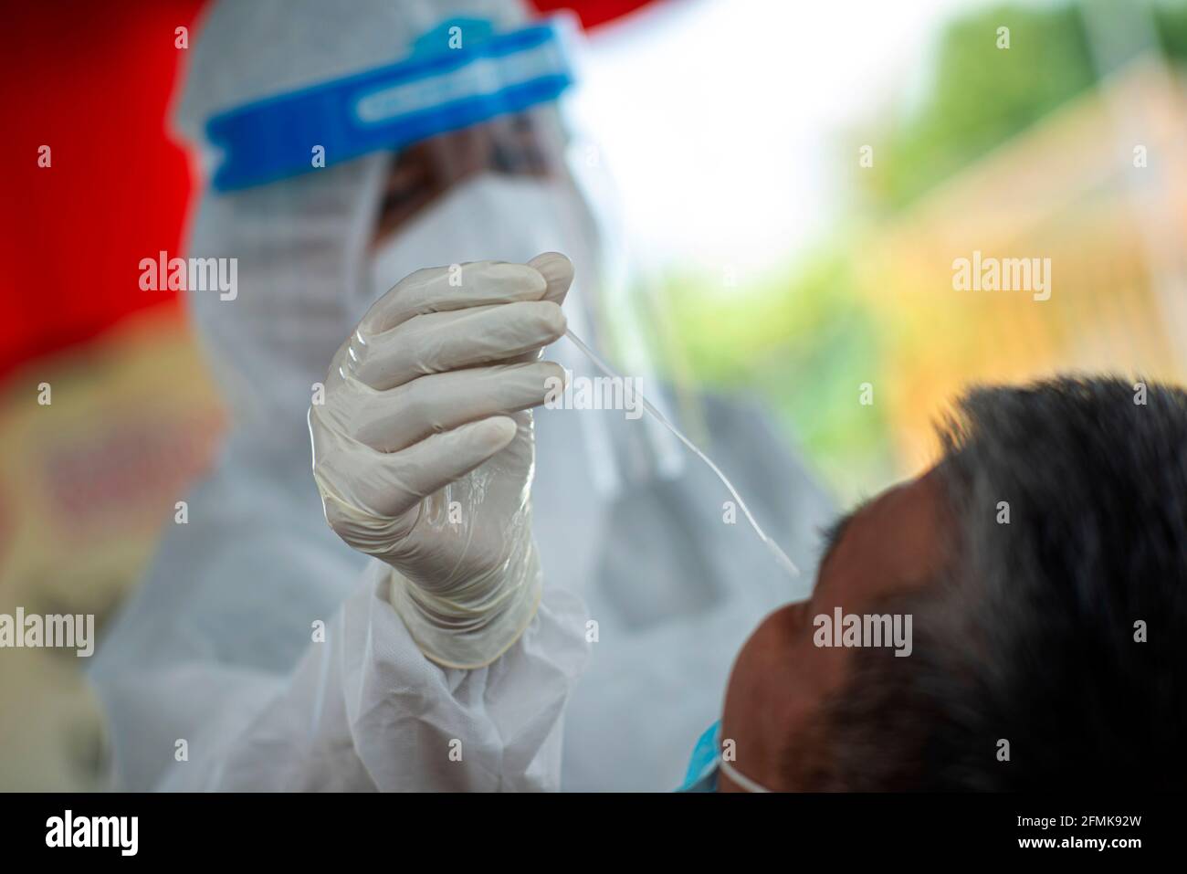 Kuala Lumpur Malaysia 10th May 2021 A Medical Worker Takes A Swab Sample For Covid 19 Test In Taman Muda Near Kuala Lumpur Malaysia May 10 2021 Malaysia Will Extend Its Movement Control