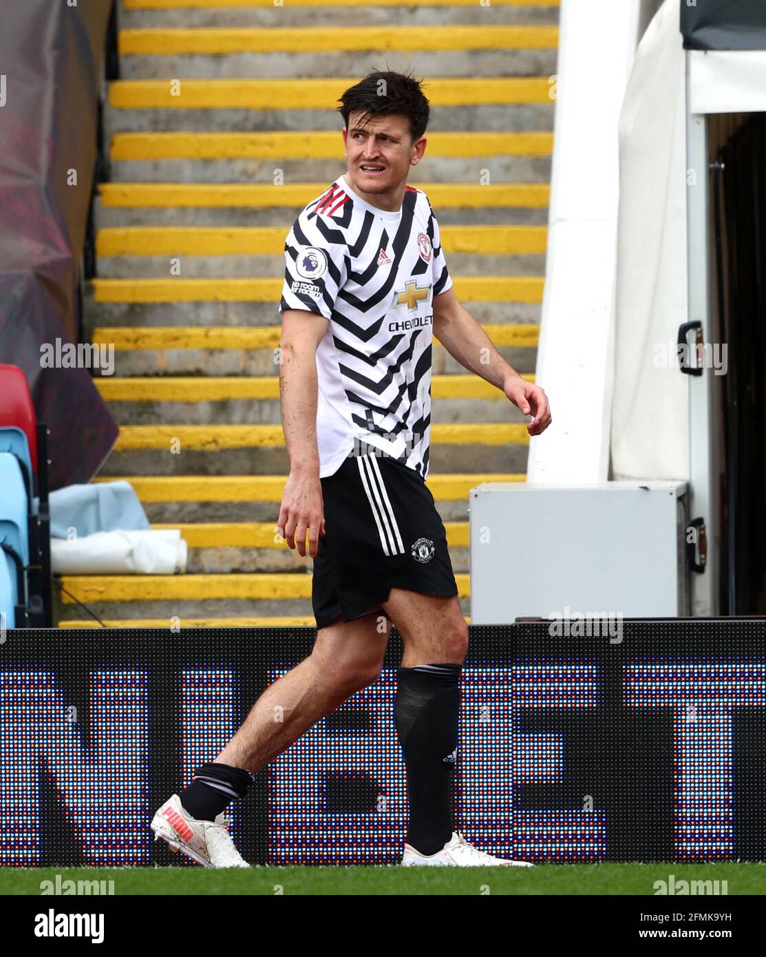 File photo dated 9-05-2021 of Manchester United's Harry Maguire leaves the field of play with an injury during the Premier League match at Villa Park. Issue date: Monday May 10, 2021. Stock Photo