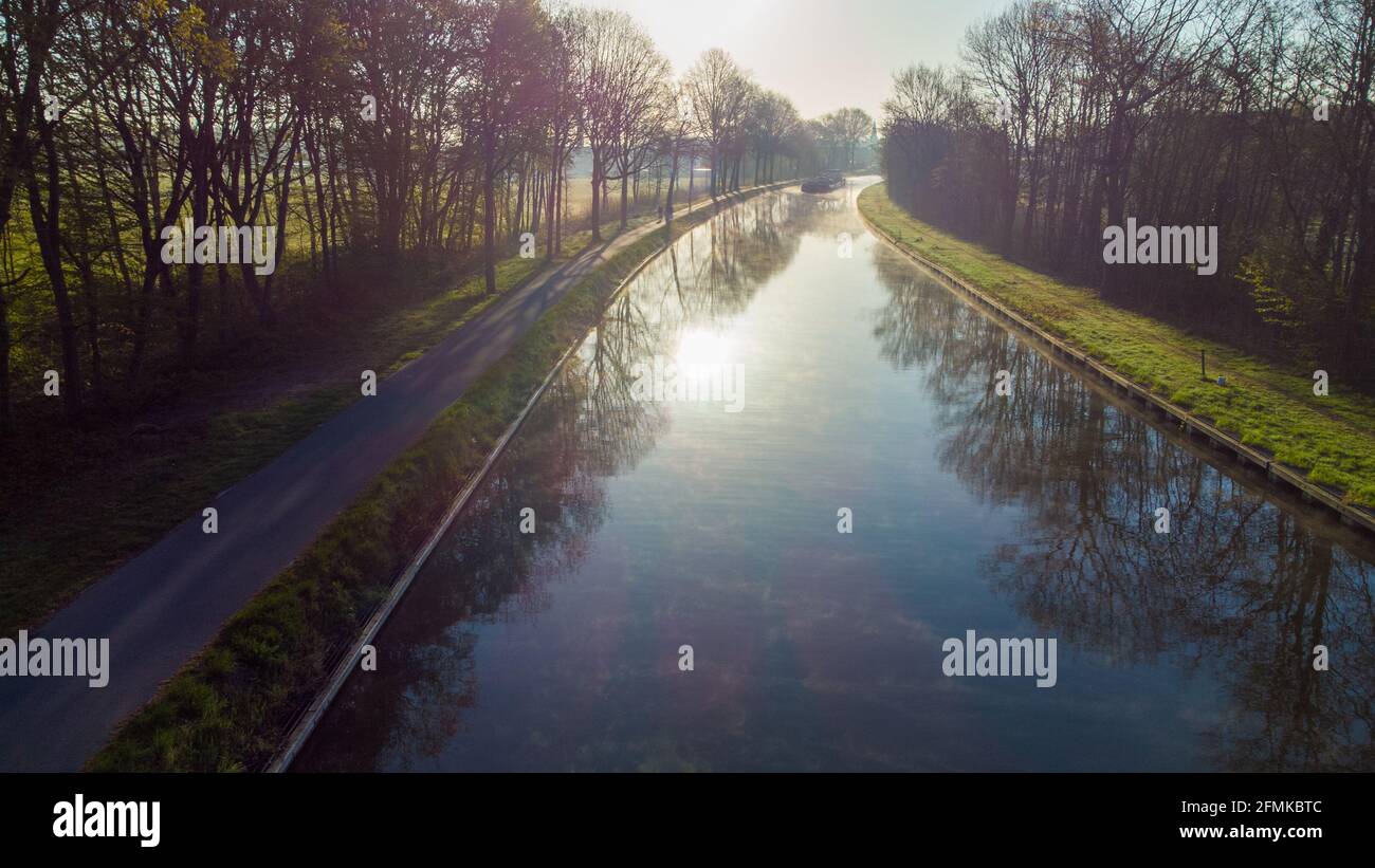Natural Stream Canals Aerial view of an Idillic river stream canal with grass banks and wild ...