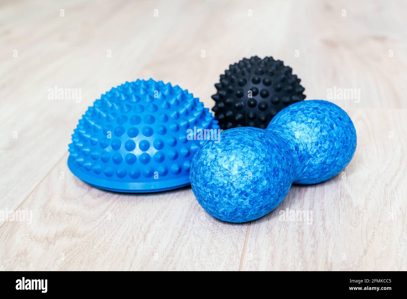 Massage tools used for trigger point therapy spiky ball, foam roller