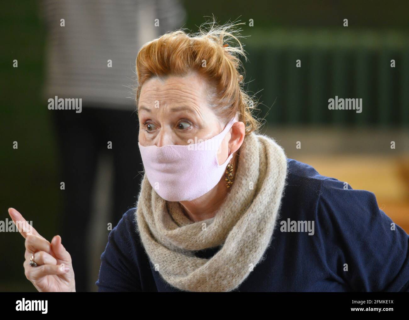 Alford House, London, UK. 10 May 2021. Rehearsals take place in central London for Grange Park Opera Surrey production of Verdi’s comic opera Falstaff with Bryn Terfel, Natalya Romaniw, Sara Fulgoni, Janis Kelly (pictured) and Chloe Morgan in masks, directed by Stephen Medcalf and conducted by Gianluca Marciano. The opera starts on 10 June at Grange Park in Surrey and is sold out. Credit: Malcolm Park/Alamy Live News. Stock Photo