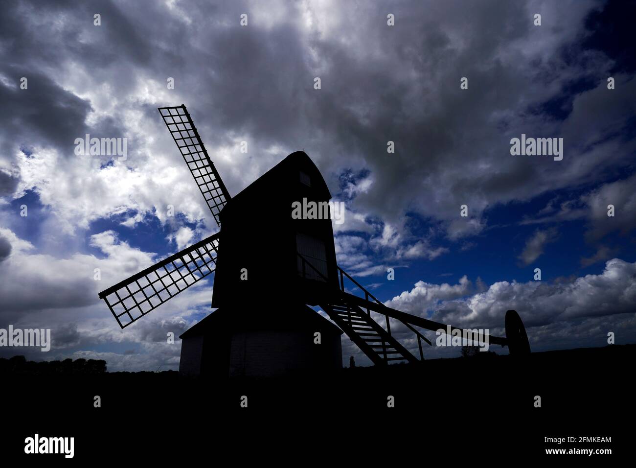 Clouds gather over the 17th century Pistone Windmill near Alyesbury. Picture date: Monday May 10, 2021. Stock Photo