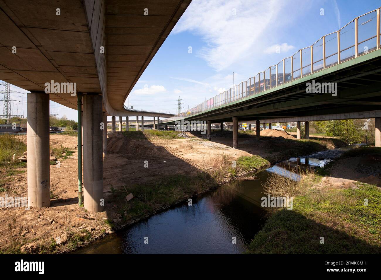 bridges of the access roads to the A1 and A59 freeways cross the river Dhuenn at the Neuland Park in Leverkusen, North Rhine-Westphalia, Germany.  Bru Stock Photo