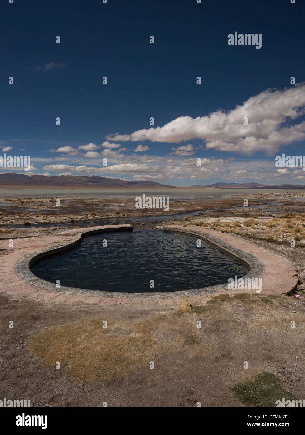 Nature landscape panorama view of outdoor swimming pool Termas de Polques hot springs Uyuni Potosi Sur Lipez Bolivia Andes mountains South America Stock Photo