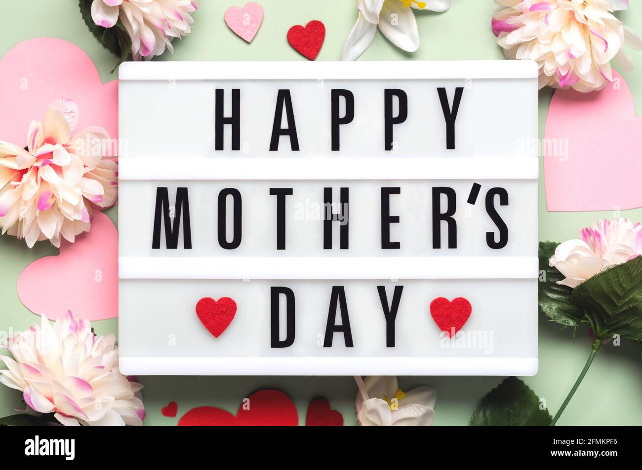 Happy Mother’s Day.Lightbox with the word Happy Mother’s Day next to