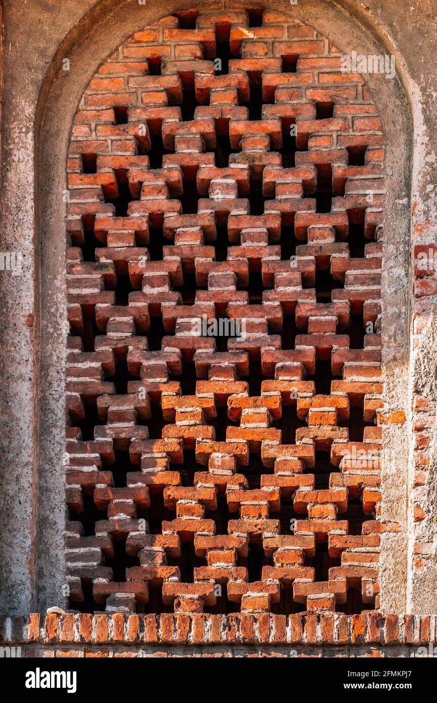 window arch in the old brick wall Stock Photo