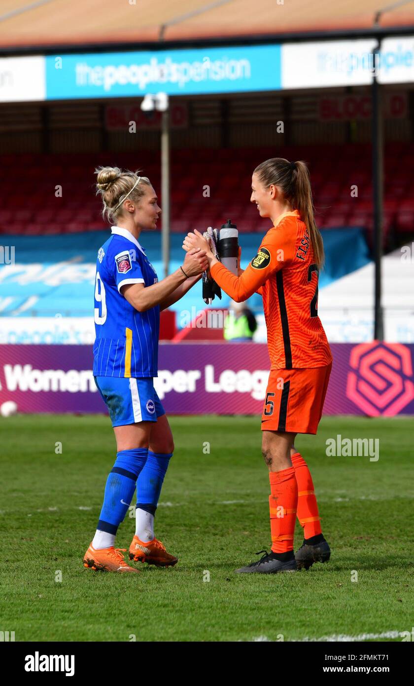 Crawley, UK. 09th May, 2021. Emily Simpkins of Brighton and Hove Albion and Cecilie Fiskerstrand Goalkeeper of Brighton & Hove Albion congratulate each other following the FA Women's Super League match between Brighton & Hove Albion Women and Bristol City Women at The People's Pension Stadium on May 9th 2021 in Crawley, United Kingdom. (Photo by Jeff Mood/phcimages.com) Credit: PHC Images/Alamy Live News Stock Photo