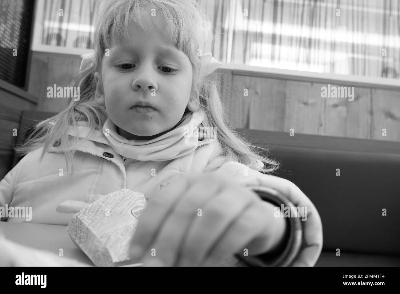 The little girl is sad. Black and white tones Stock Photo - Alamy