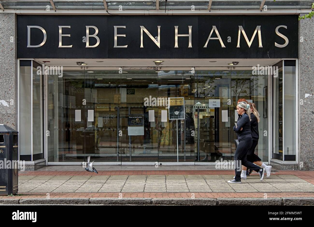 Belfast, UK. 09th May, 2021. Shoppers seen walking past the Debenhams
