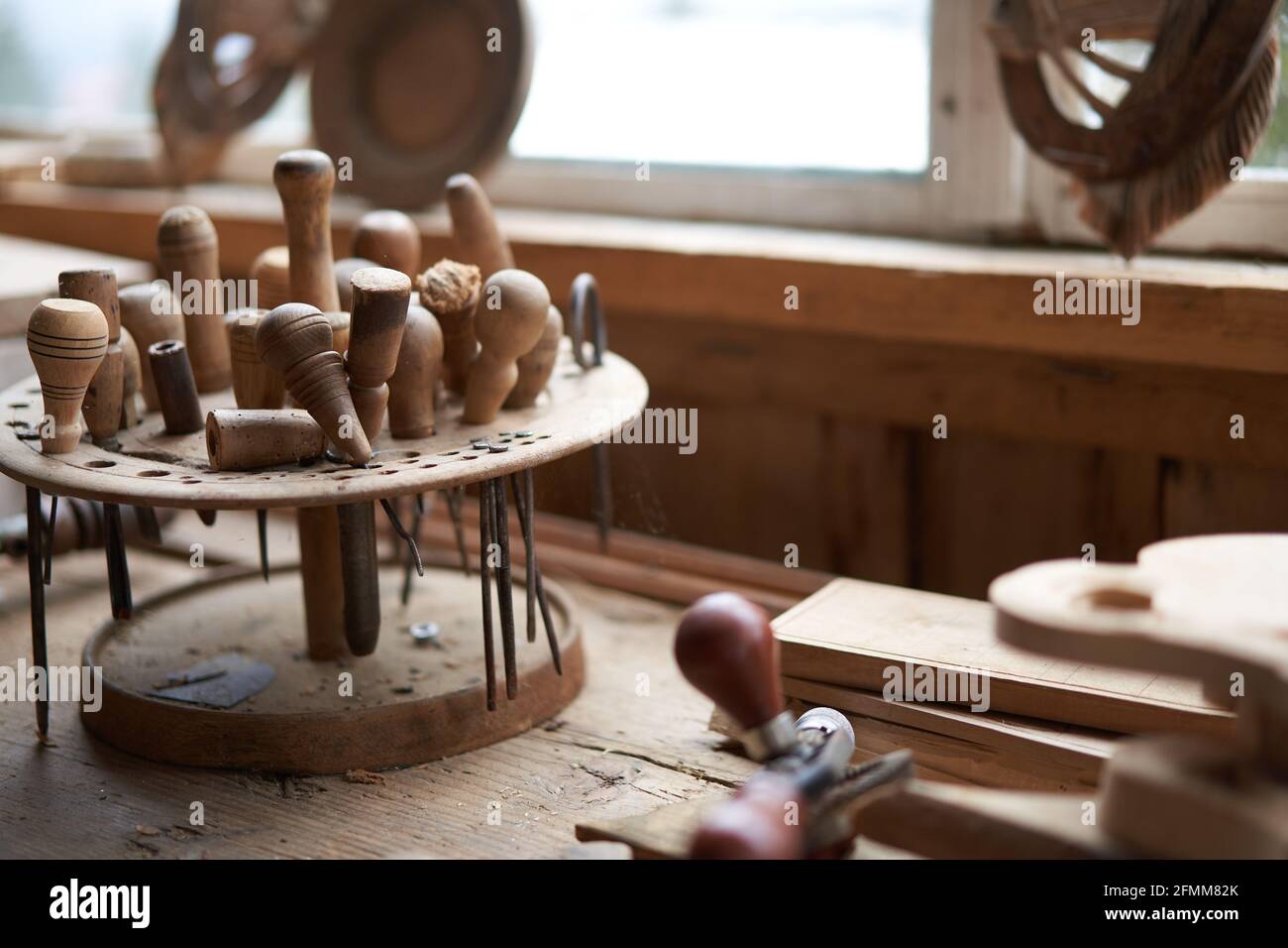 Wood carving tool Carpenter tools in stand at workplace Handmade