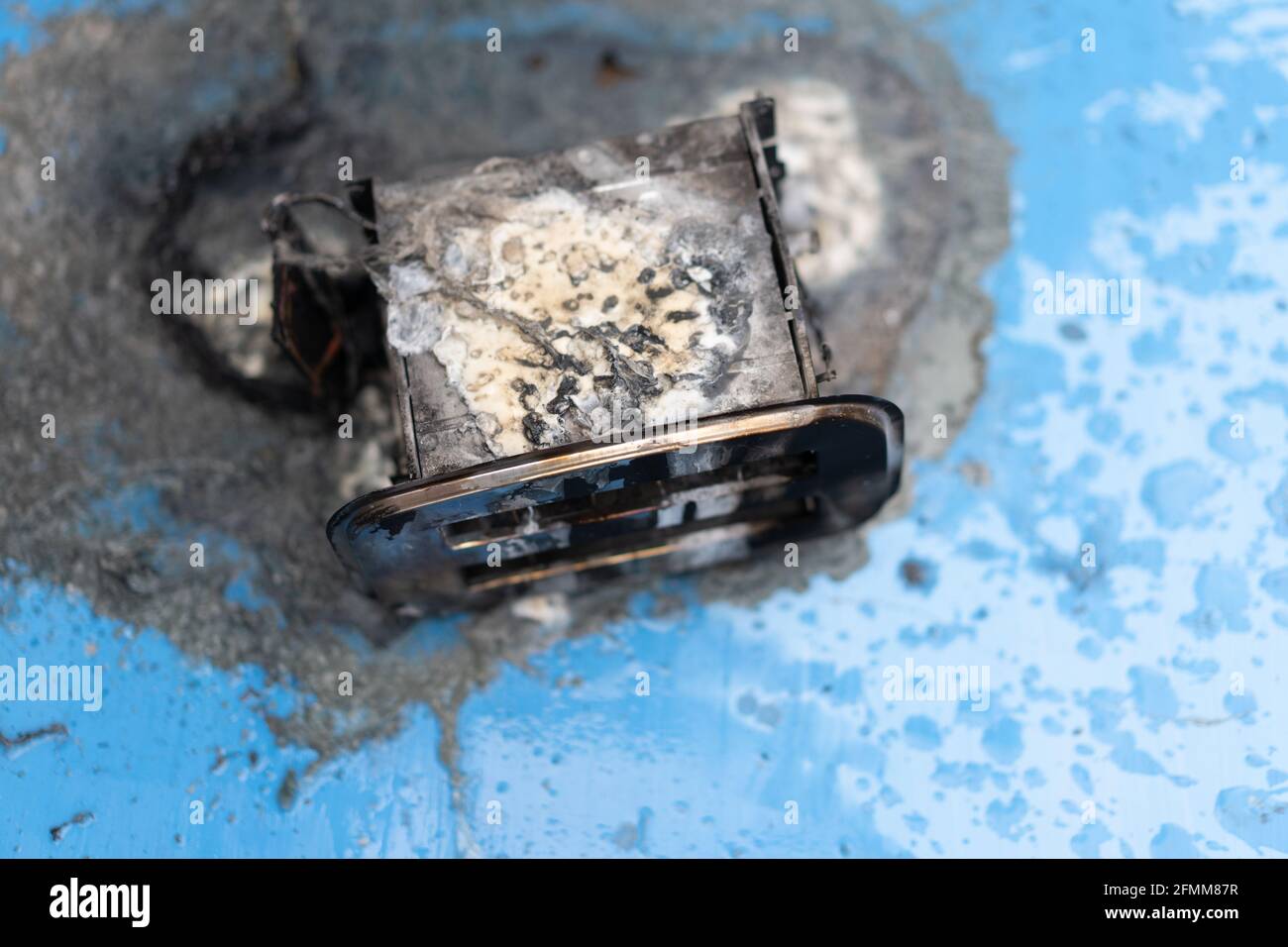 Toaster after fire. Household electrical appliance fire hazard