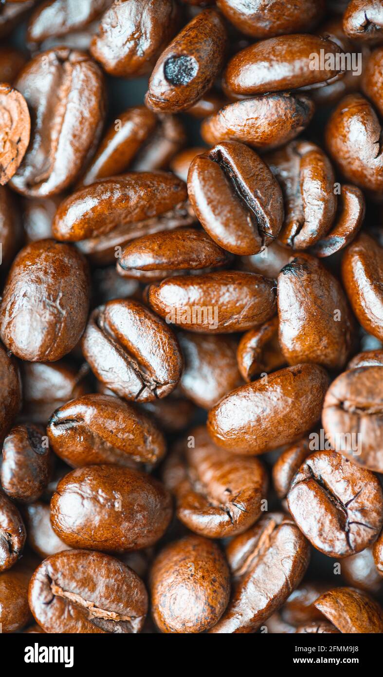 Roasted coffee beans - background with copy space Stock Photo - Alamy