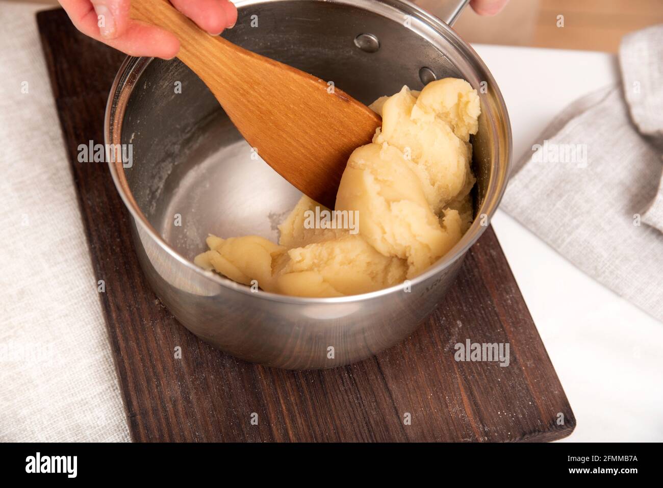 Bread dough in a metal mixing bowl - Stock Image - F016/4152 - Science  Photo Library