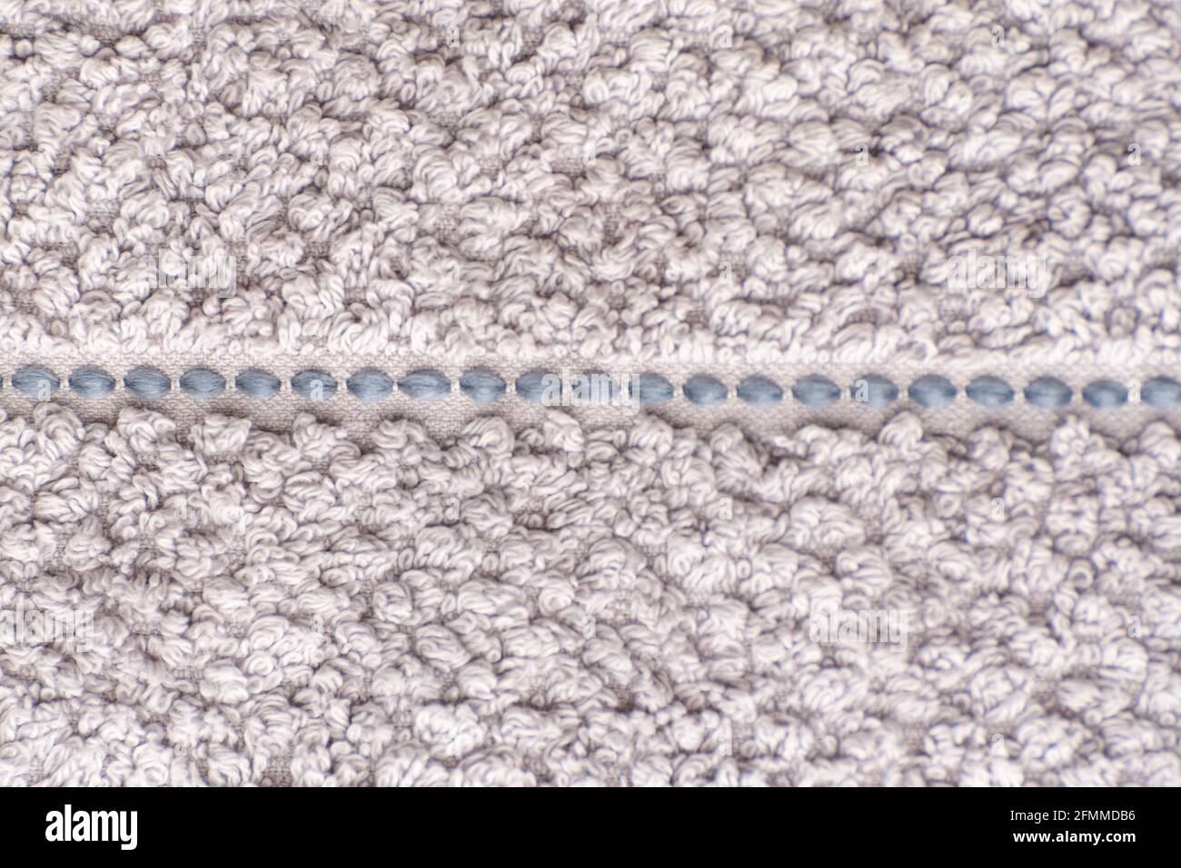Abstract gray background. Rough texture. Terry towel. Stock Photo