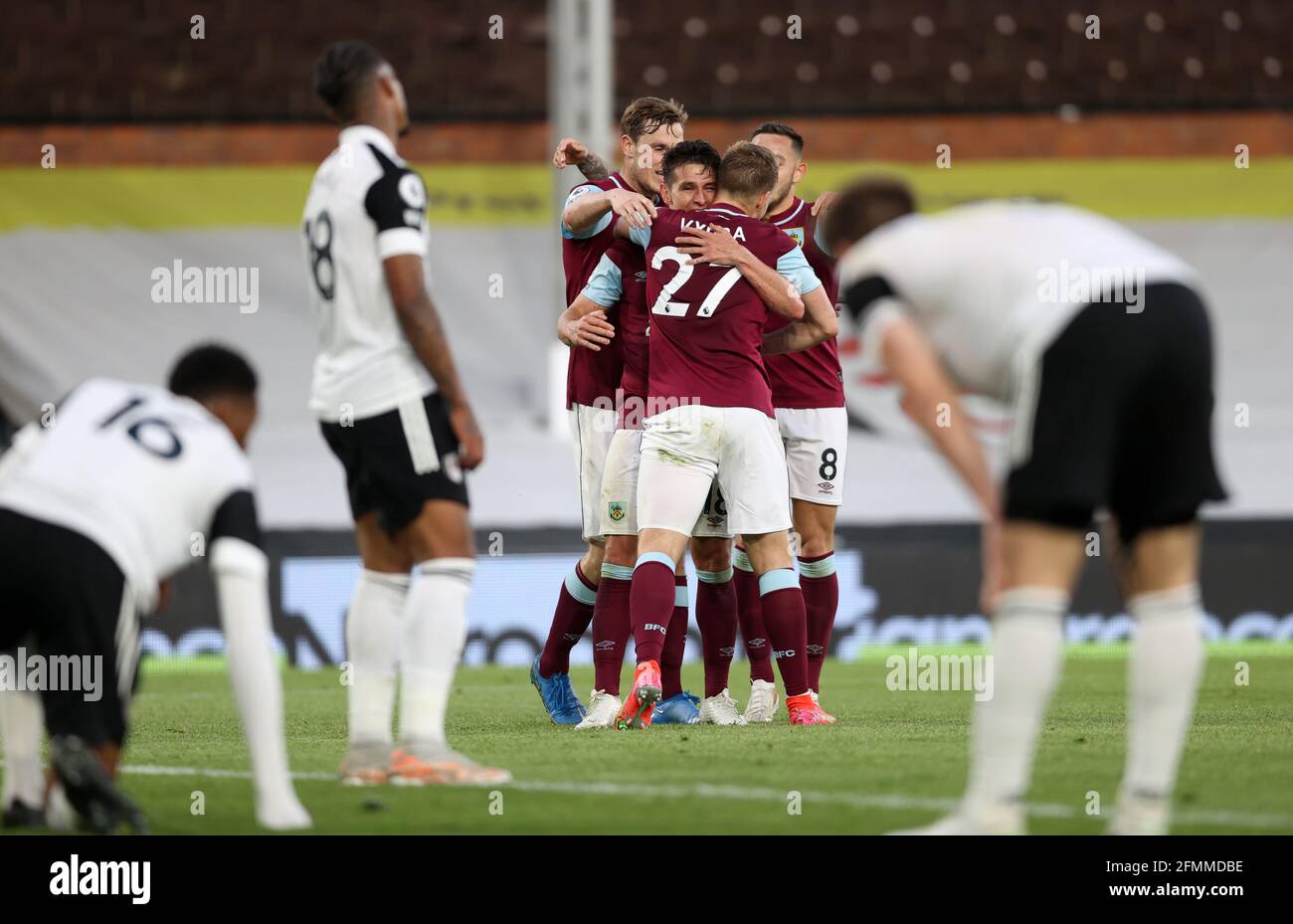 Burnley's Ashley Westwood celebrates scoring their side's first goal of the game during the Premier League match at Craven Cottage, London. Picture date: Monday May 10, 2021. Stock Photo
