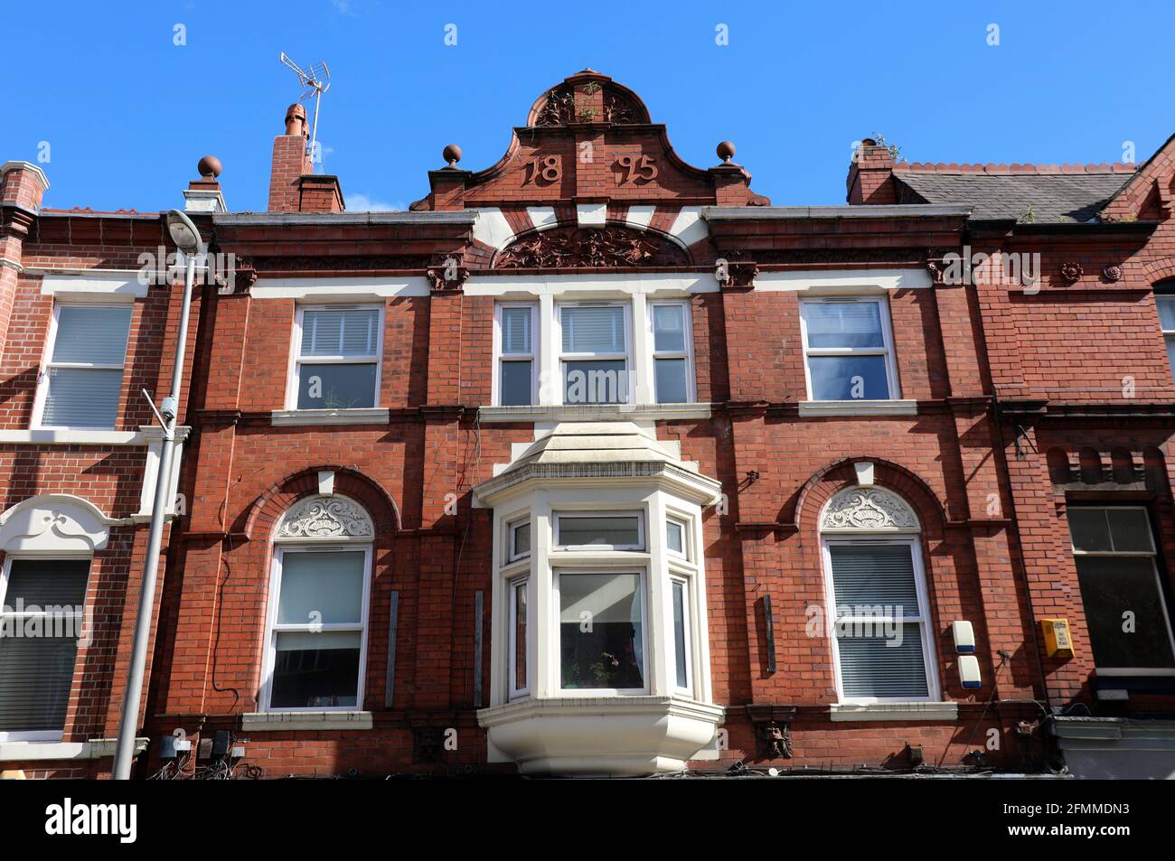 Victorian era red brick property dated 1895 in Altrincham Stock Photo