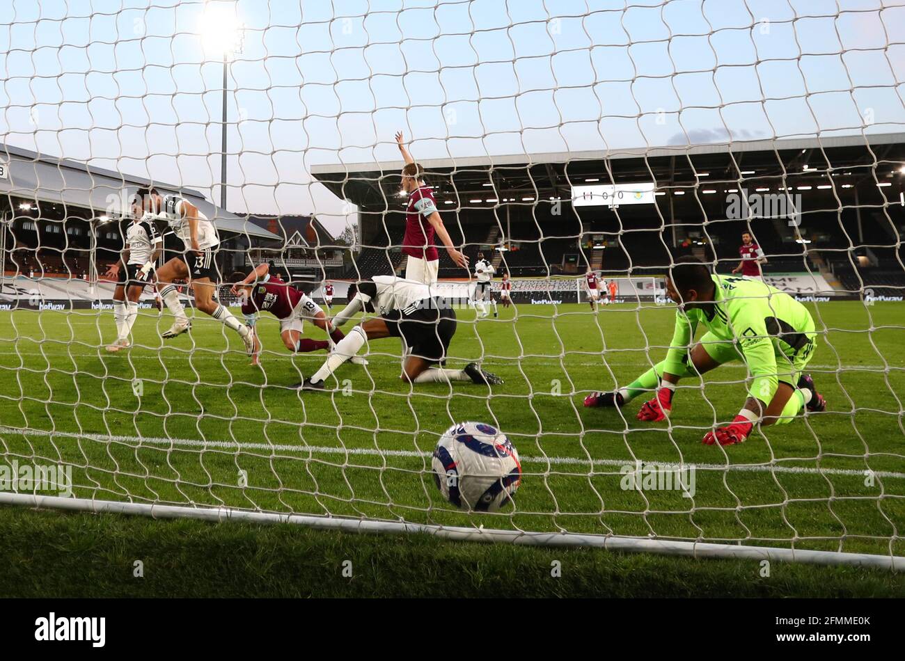 Burnley's Ashley Westwood scores their side's first goal of the game during the Premier League match at Craven Cottage, London. Picture date: Monday May 10, 2021. Stock Photo