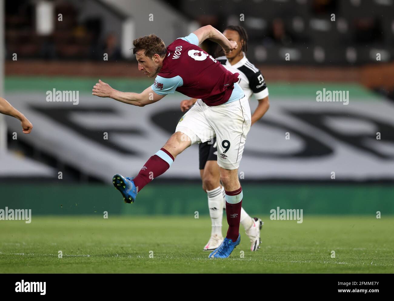 Burnley's Chris Wood scores their side's second goal of the game during the Premier League match at Craven Cottage, London. Picture date: Monday May 10, 2021. Stock Photo