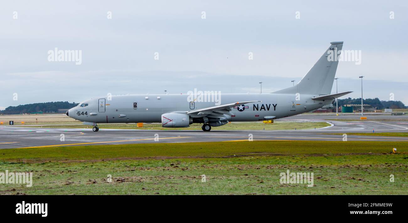 RAF Lossiemouth, Moray, Scotland, UK, 26th of Jan 2021: An America Boeing’s Poseidon MRA1 (P-8A) taxing to the runway at RAF Lossiemouth.  Six (P-8A) Stock Photo