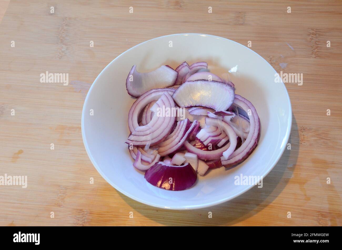 freshly sliced red onions, cooking ingredients for salad recipe Stock Photo