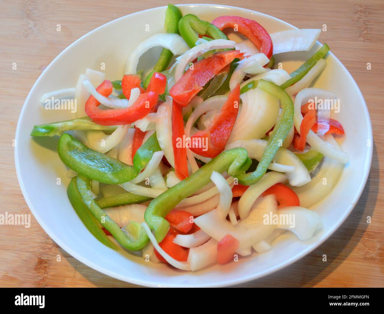 sweet peppers and onion, mediterranean cuisine. cooking ingredients and salad Sid order recipe Stock Photo