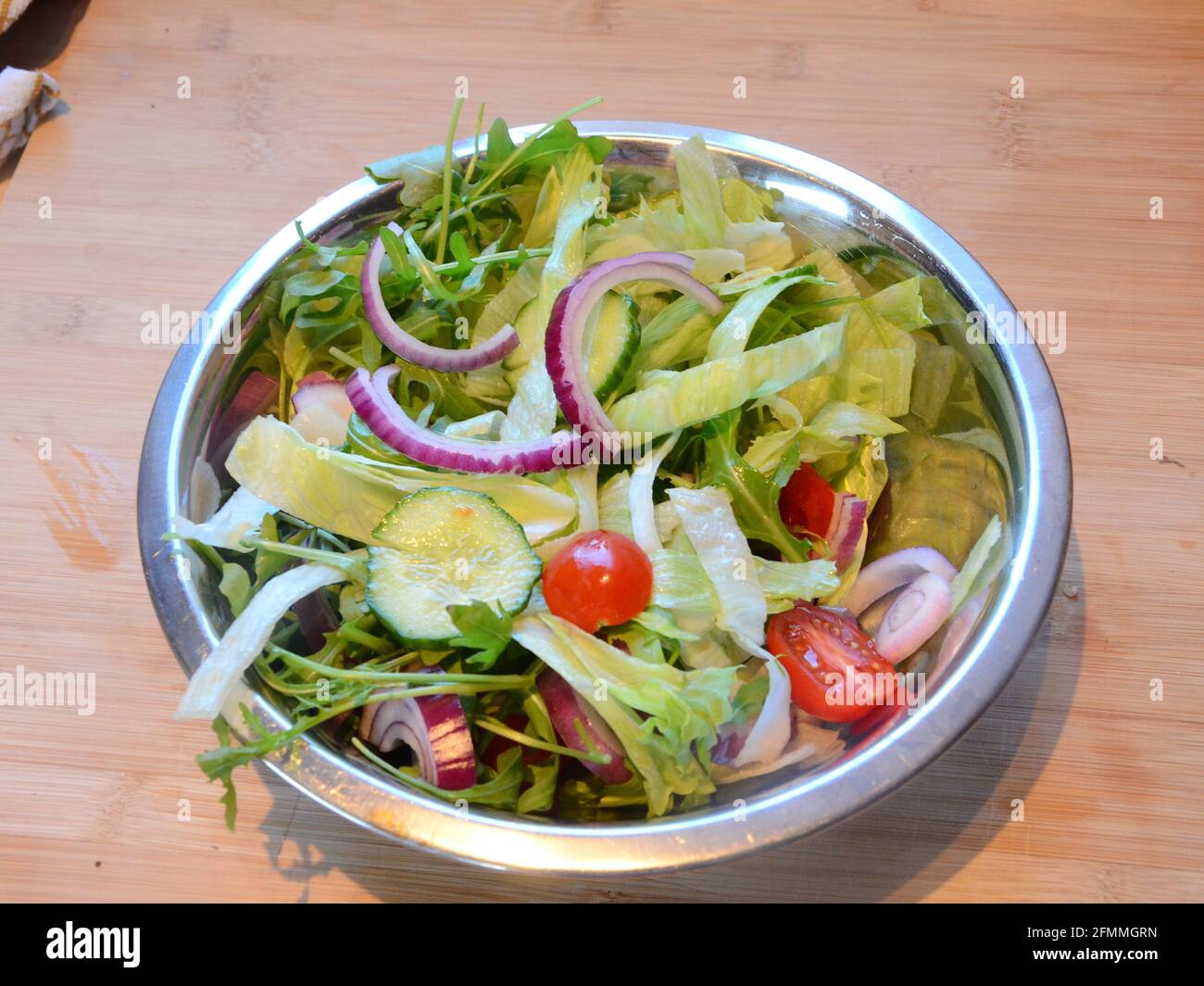 mixed fresh salad bowl, side dish for summer menu Stock Photo Alamy