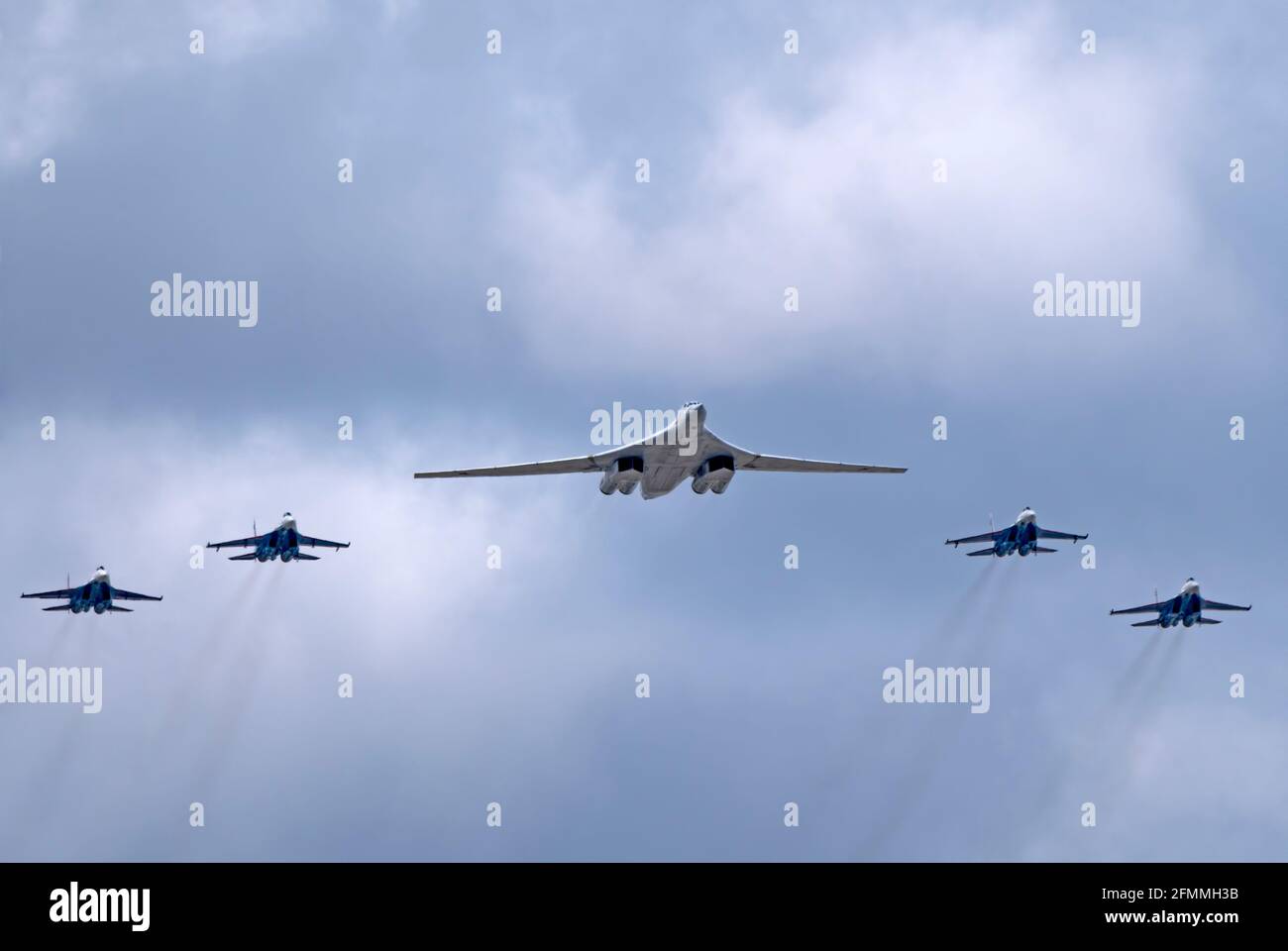 MOSCOW, RUSSIA - MAY 7, 2021: Avia parade in Moscow. su-35 and strategic bomber and missile platform Tu-160 in the sky on parade of Victory in World W Stock Photo