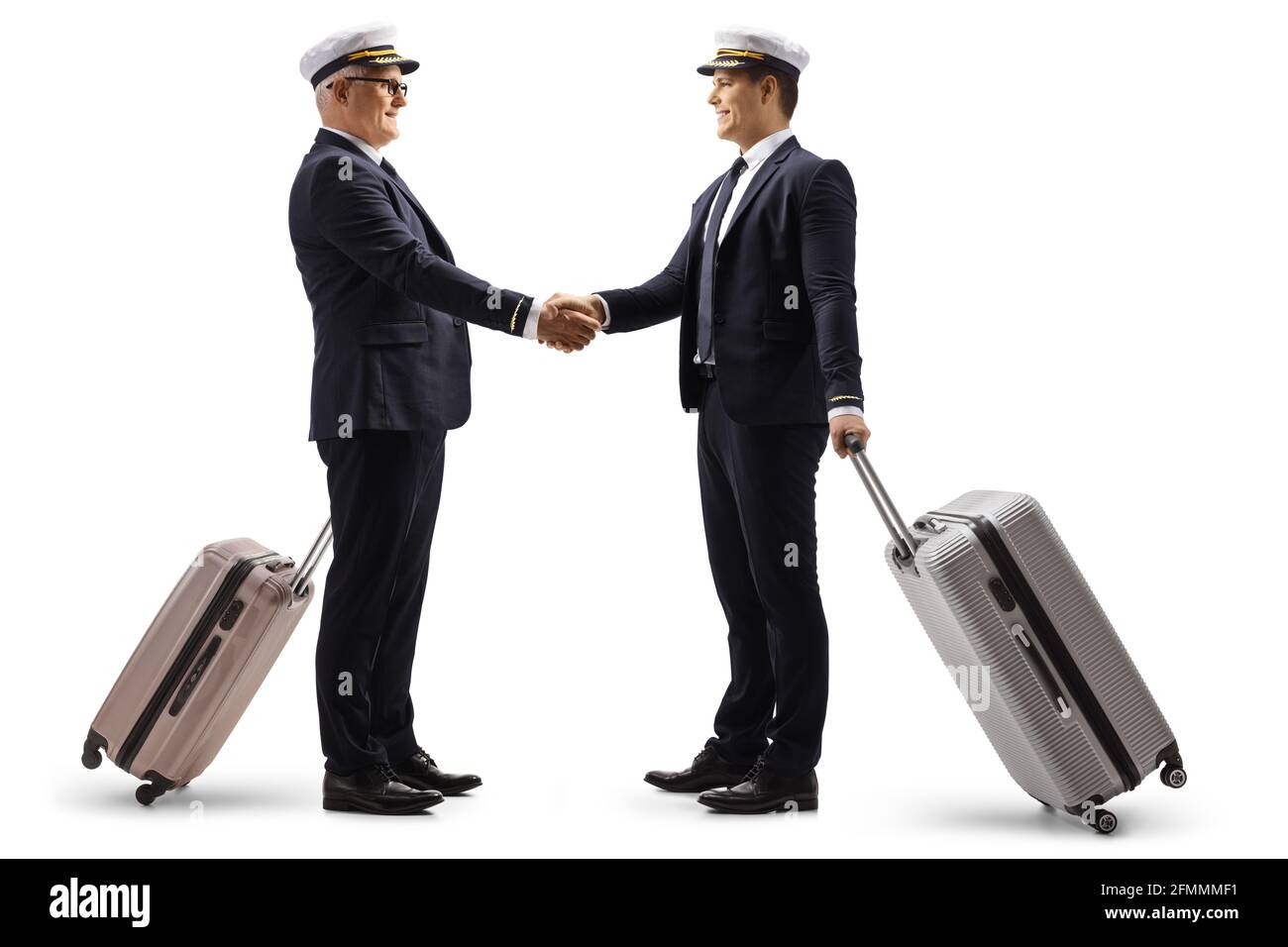 Two pilots with suitcases shaking hands isolated on white background