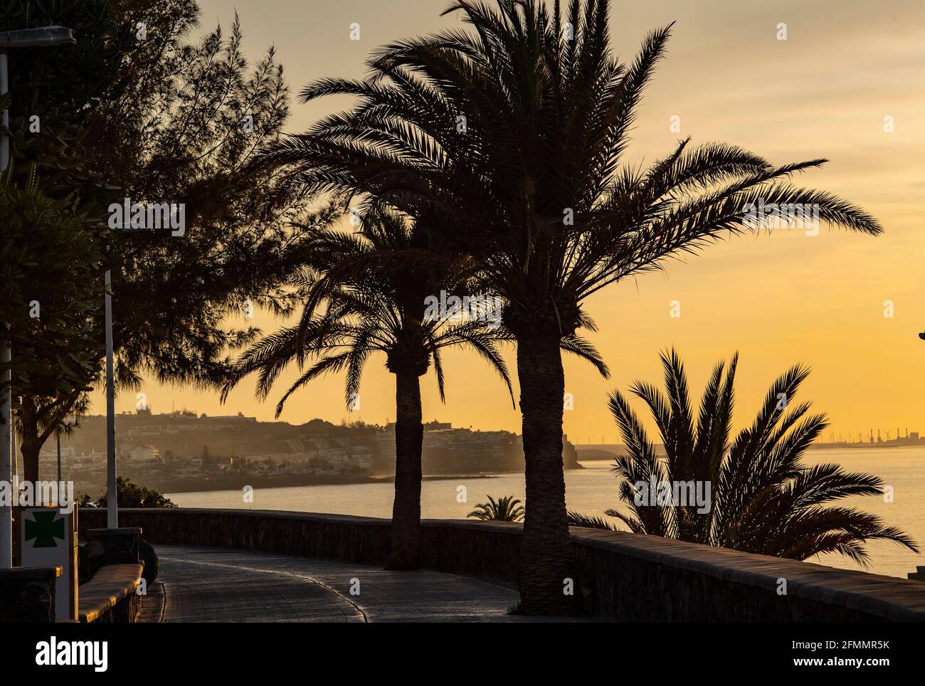the empty promenade at Playa del Ingles at sunrise Stock Photo