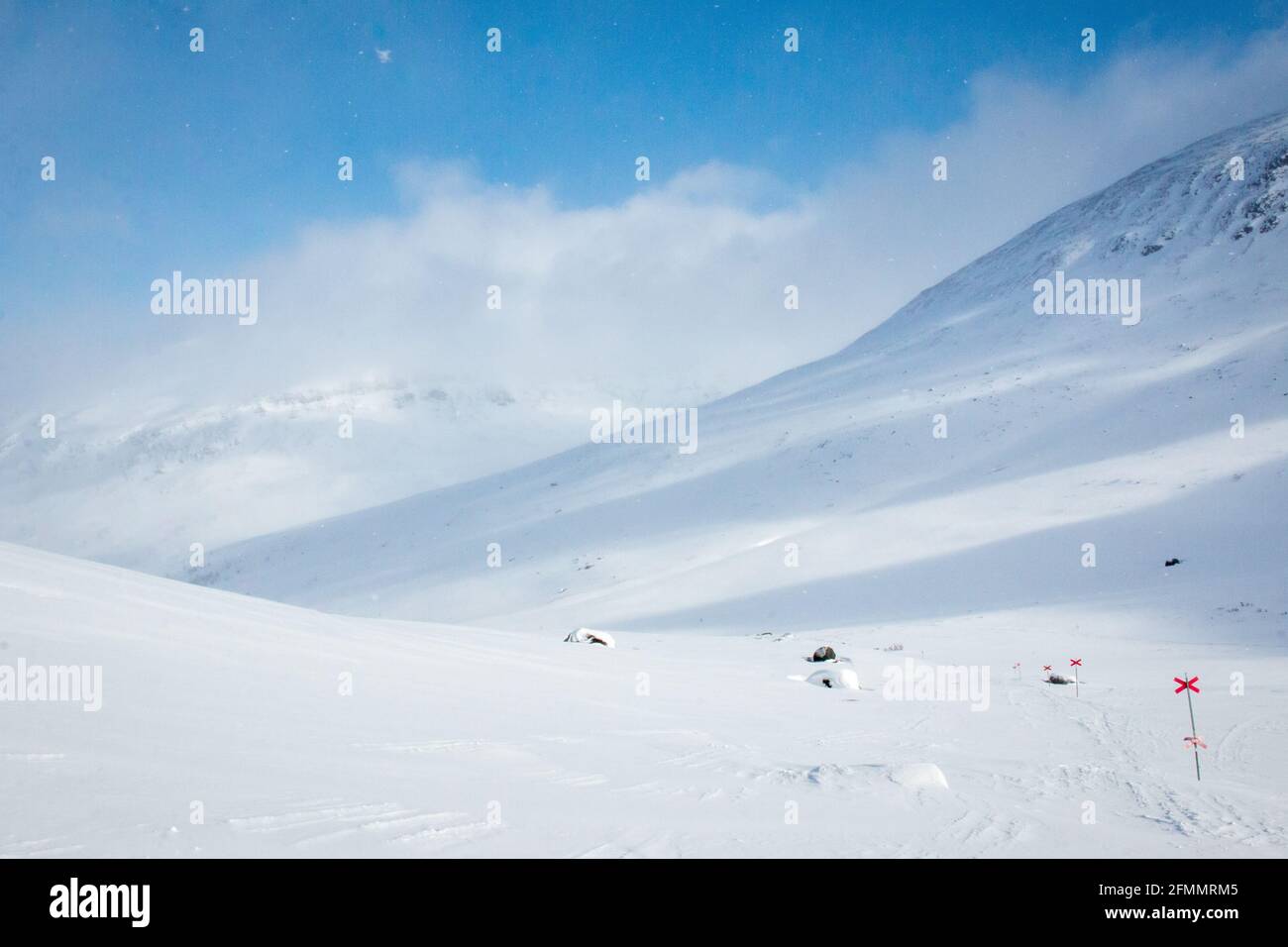 Snowshoeing Kungsleden trail from Abisko to Nikkaluokta in early April, Swedish Lapland Stock Photo