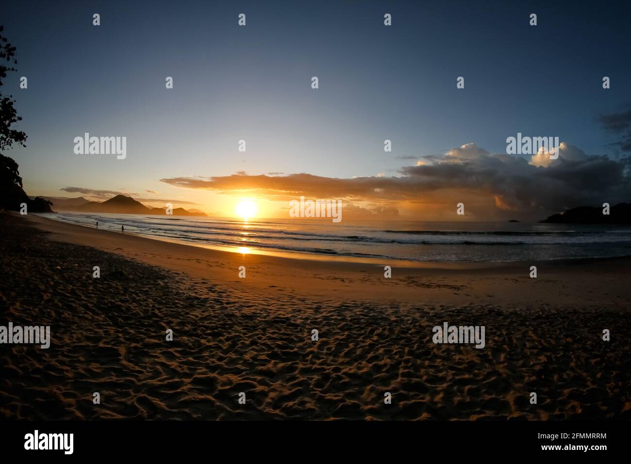 Por do sol na praia lindo. Stock Photo