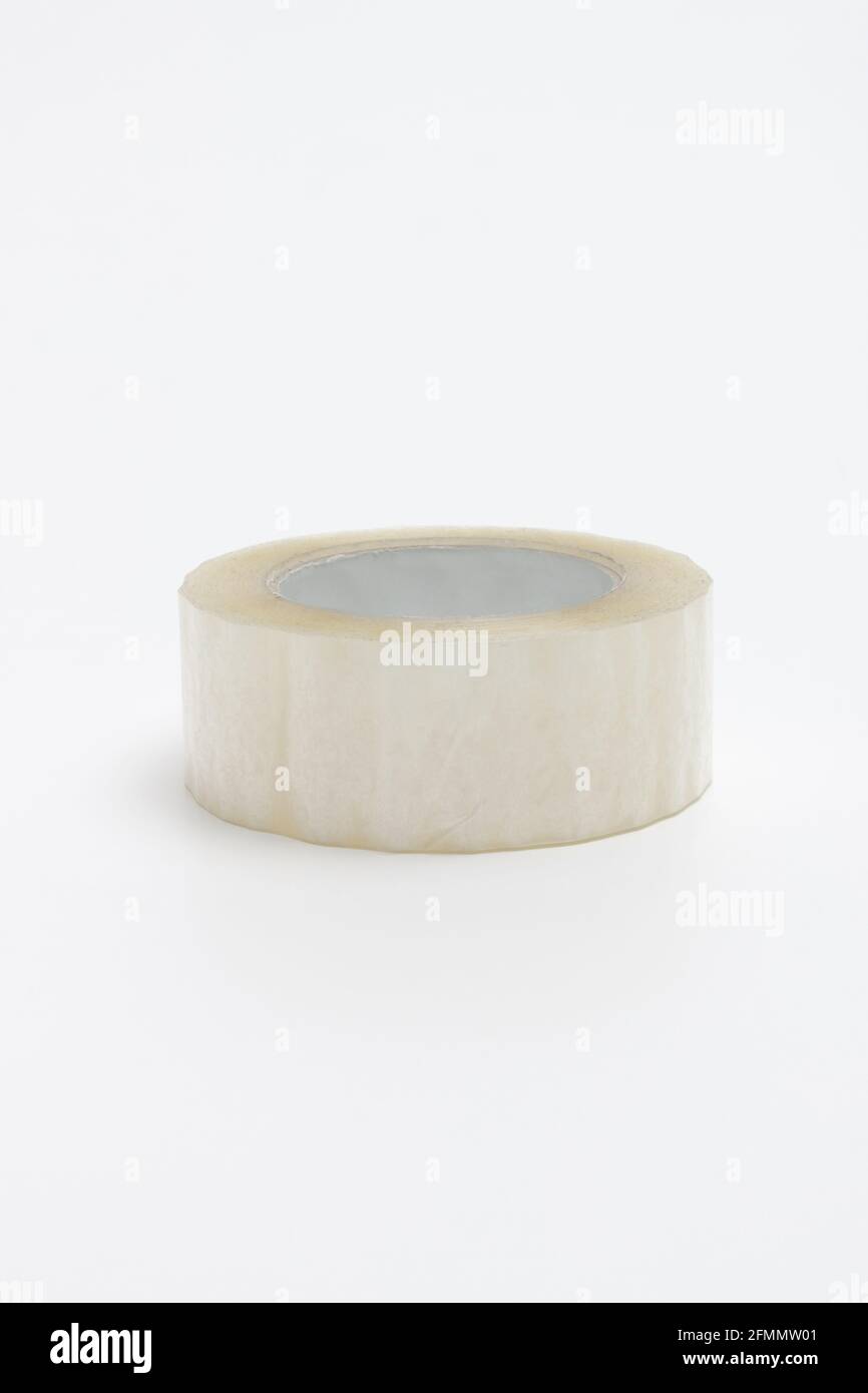 A roll of adhesive scotch tape isolated on white background. Scotch tape on a white background