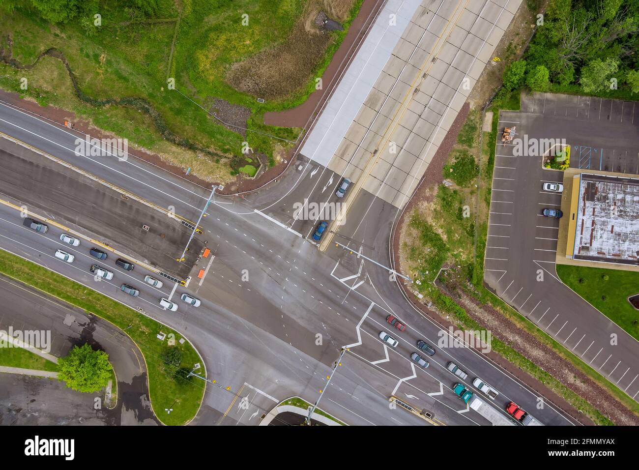 Aerial top view of highway junction road in urban populated area ...