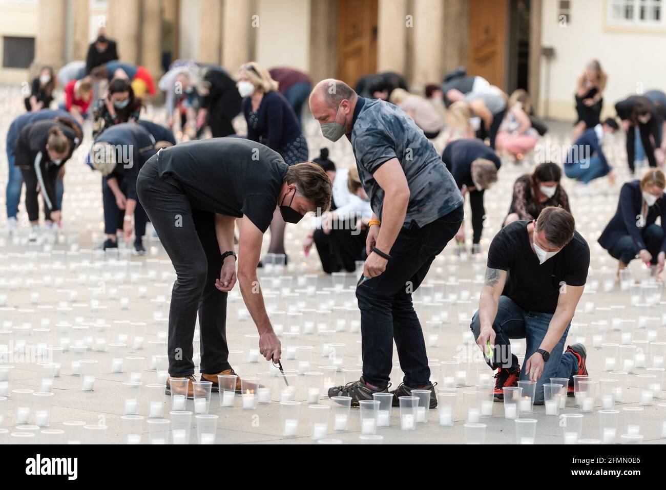 Prague, Czech Republic. 10th May, 2021. People light candles to commemorate victims of the COVD-19 pandemic. Prague Caste commemorates almost 30000 victims of Covid-19 pandemic in Czech Republic with thousands of candles. Credit: SOPA Images Limited/Alamy Live News Stock Photo