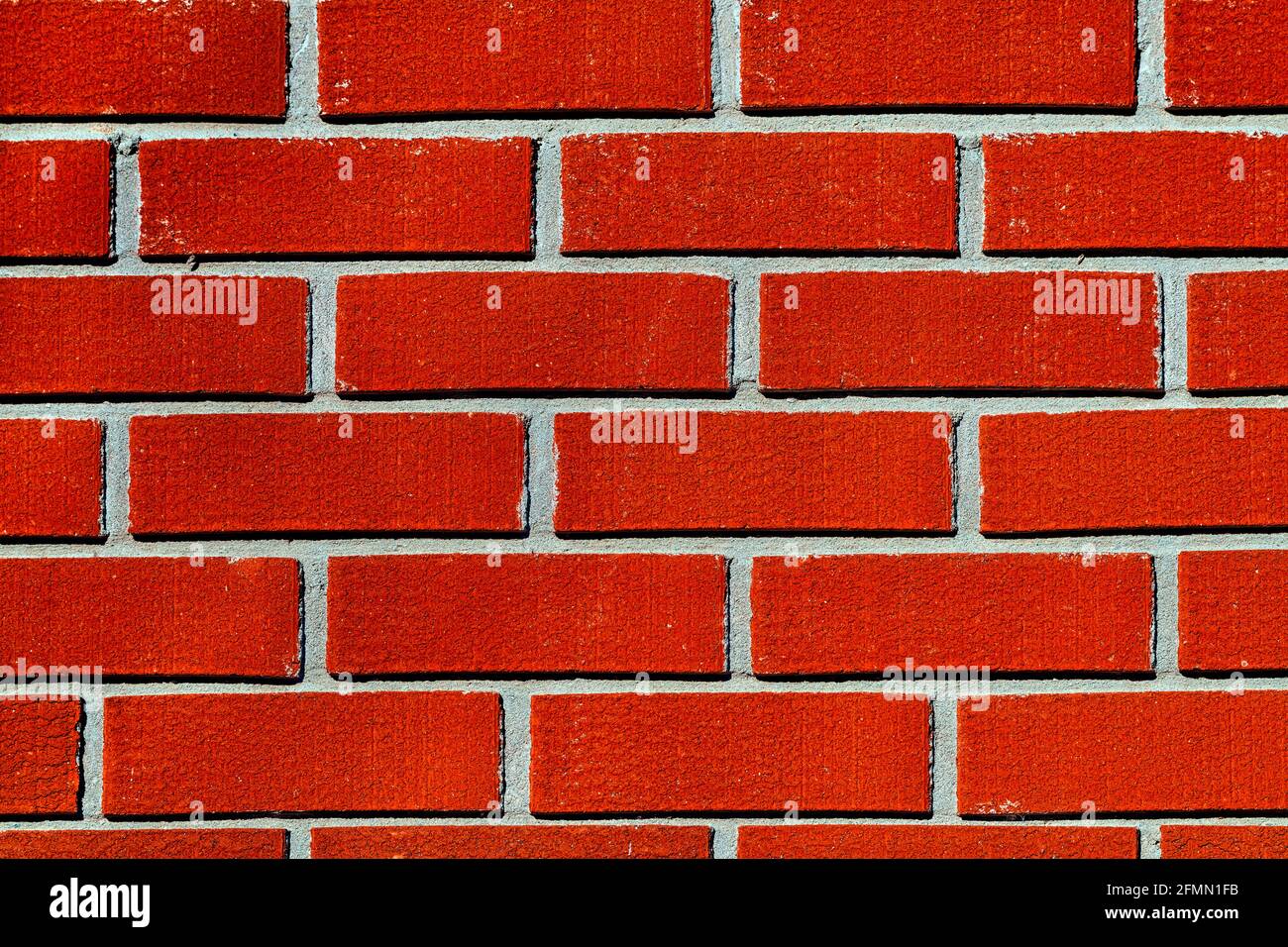 A full frame image of a red brick wall Stock Photo