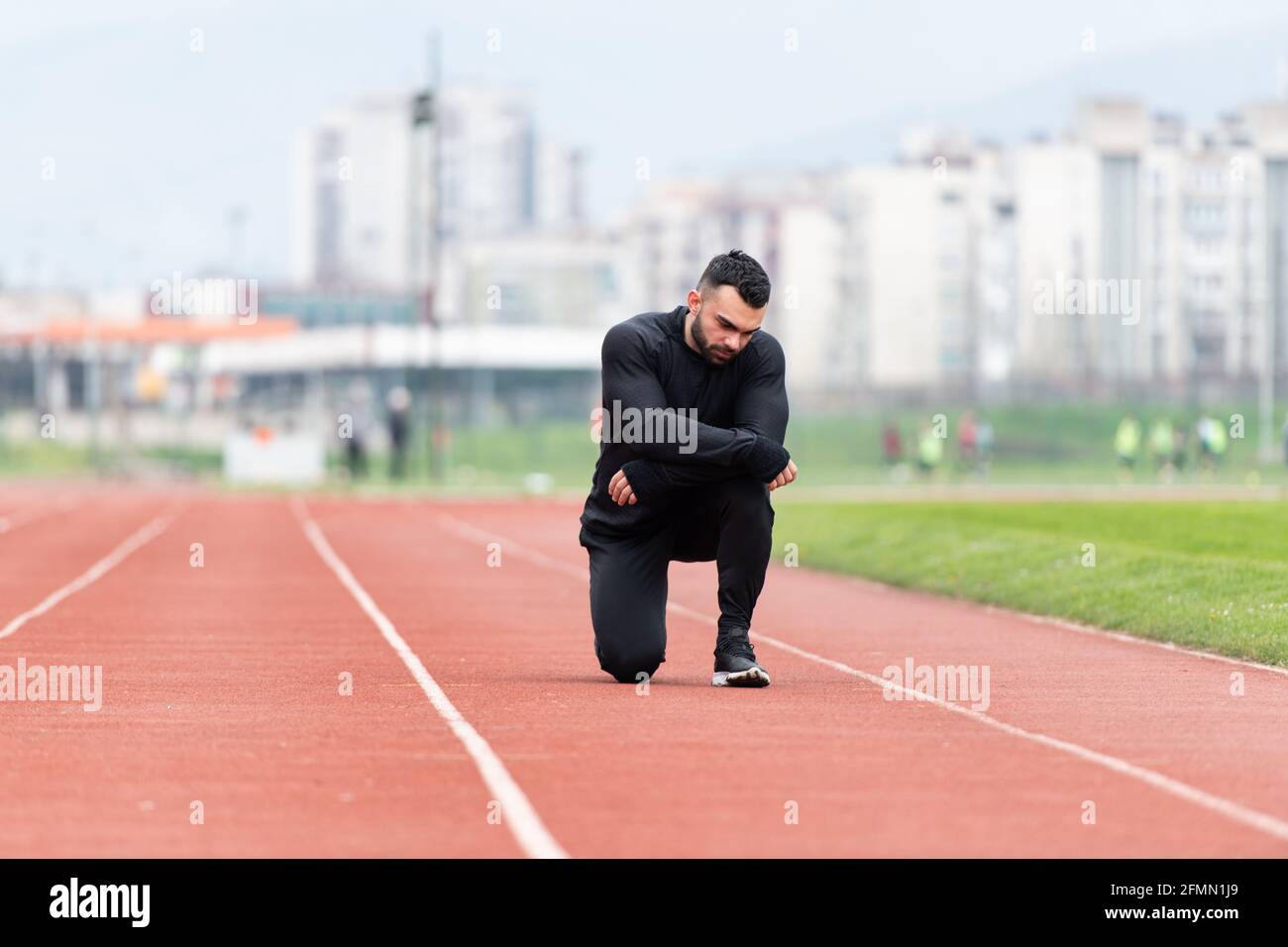 Man Stretching Legs Breaking Relax After Running Tired - Rest Training  Sport Healthy Lifestyle Athlete Stock Photo - Alamy