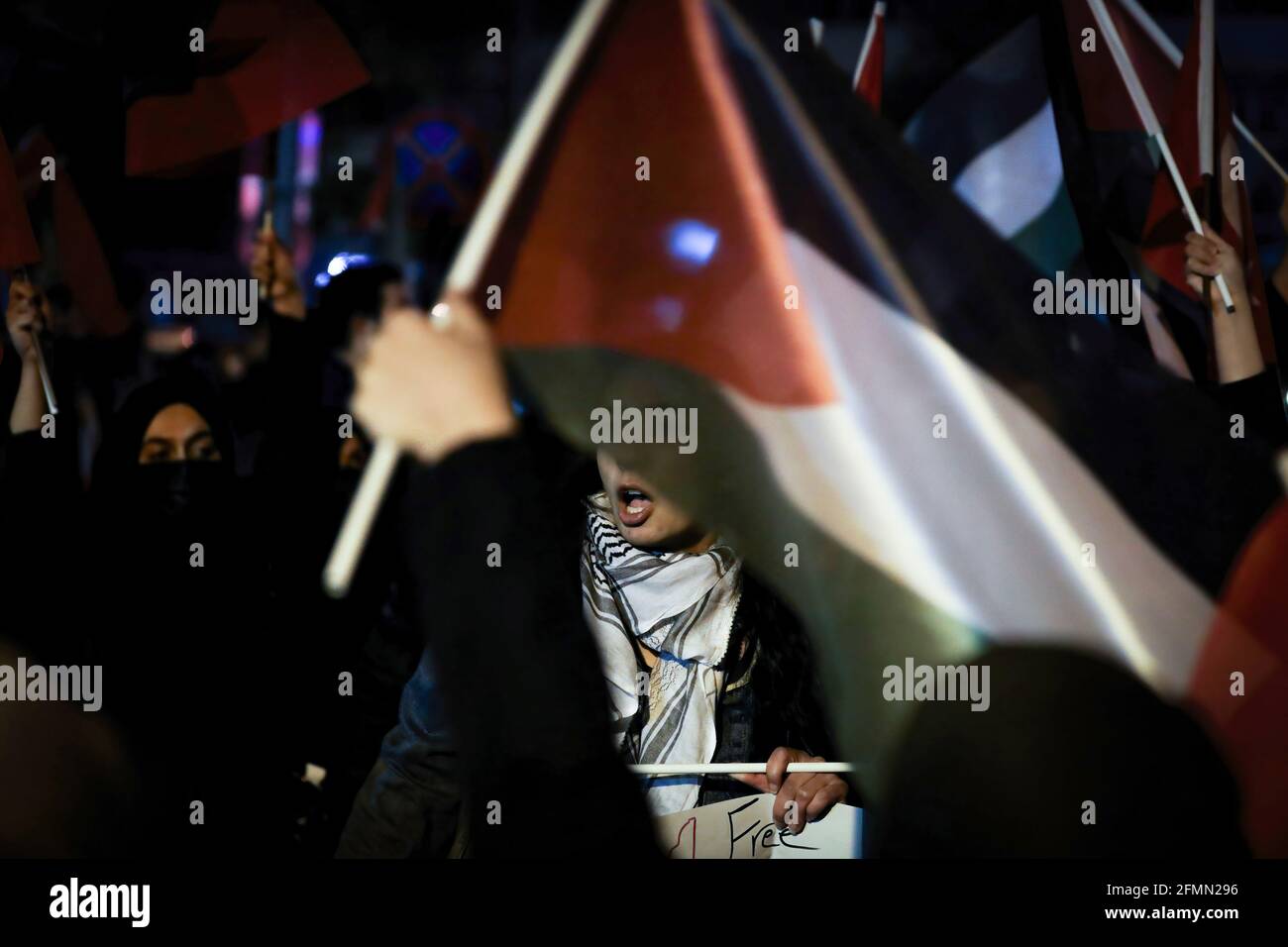 Ankara, Turkey. 10th May, 2021. A protester holds a flag during the demonstration. People gathered in front of the Israeli Embassy in Ankara to protest against the entry of Israeli security forces into Masjid al-Aqsa, which is considered a sacred place for Muslims. Credit: SOPA Images Limited/Alamy Live News Stock Photo