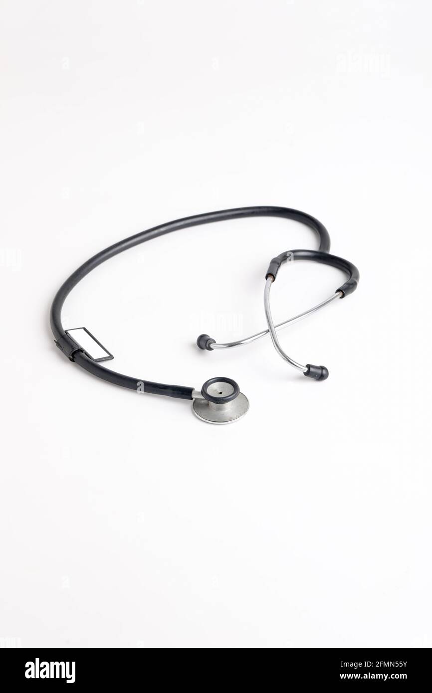 Black stethoscope on white background Stock Photo - Alamy