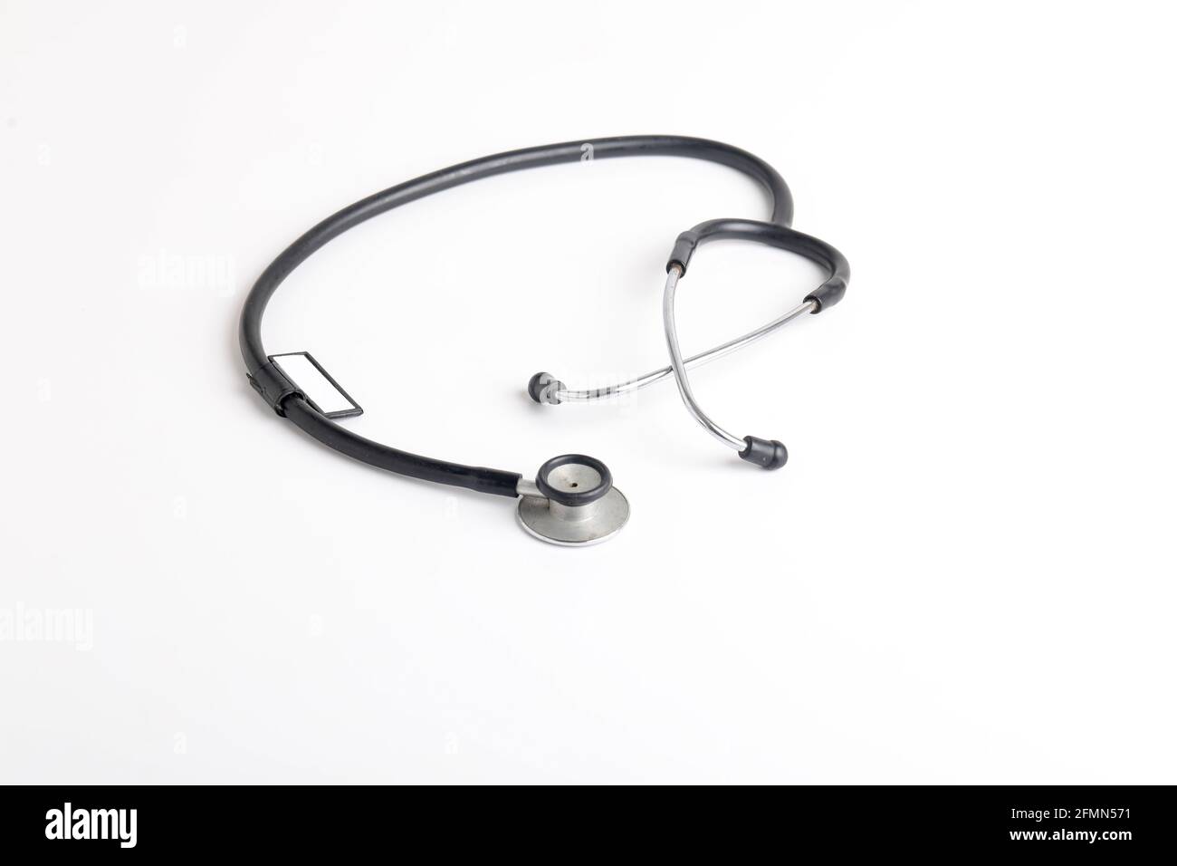 Black stethoscope on white background Stock Photo - Alamy