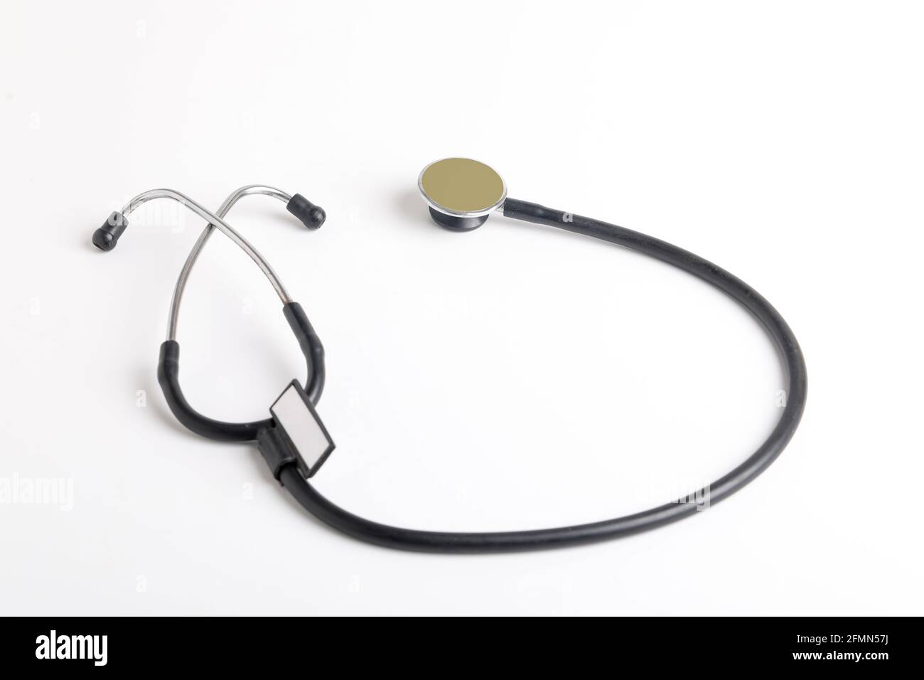 Black stethoscope on white background Stock Photo - Alamy