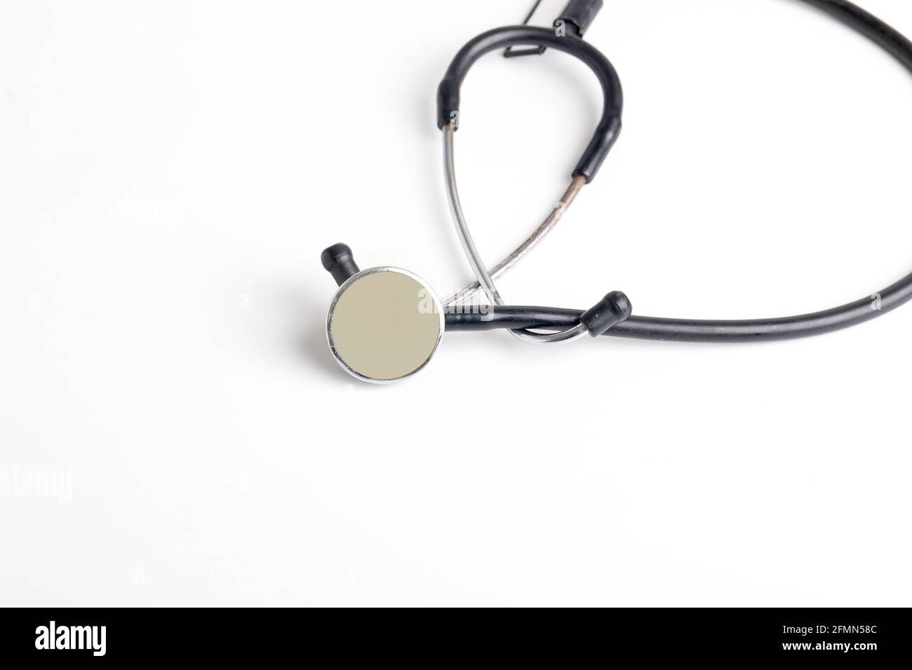 Black stethoscope on white background Stock Photo - Alamy