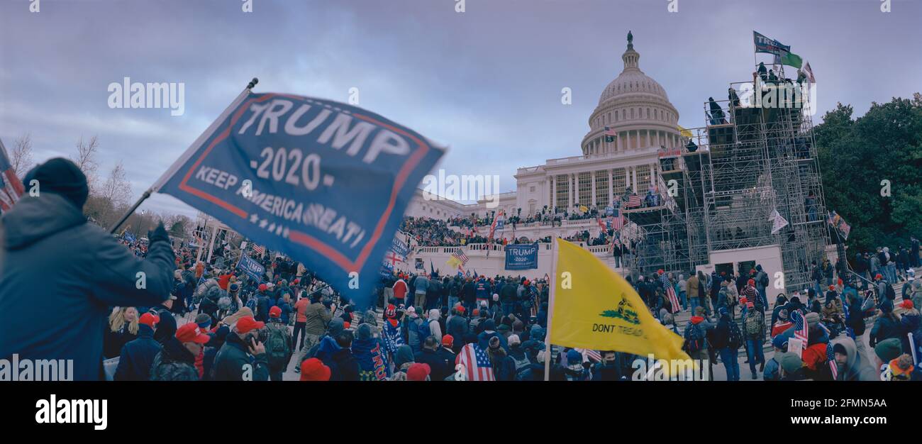 January 6.2021, Large crowds of President Trump supporters descending on US Capitol Building after Save America March. Capitol Hill, Washington DC USA Stock Photo