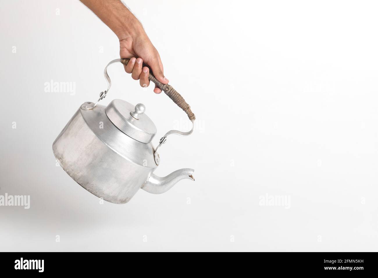 Aluminum tea kettle or tea pot on white background Stock Photo Alamy