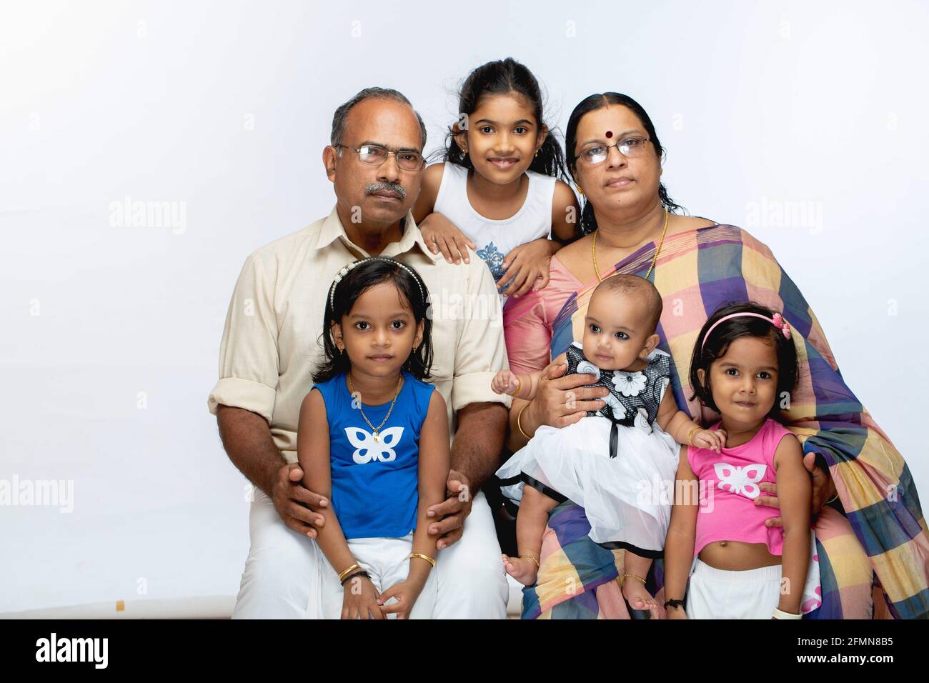 Happy Indian Family ,grand parents and children,isolated on white background. Stock Photo