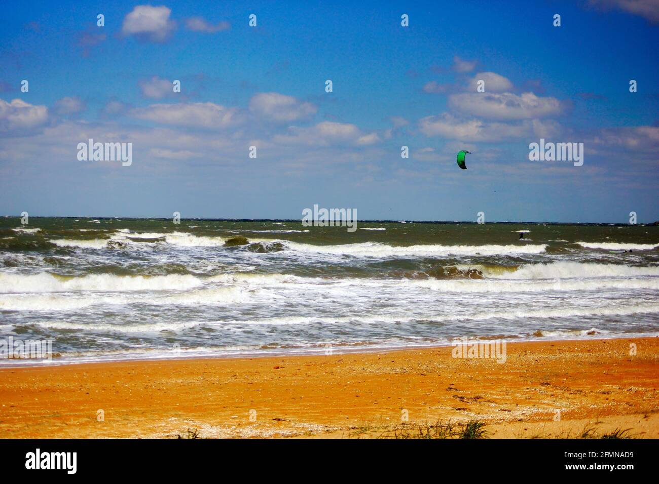 Azov Sea coast, Kazantip nature reserve, Shchelkino town, high wave at sea, kitesurfing, windsurfing. Republic of Crimea Stock Photo